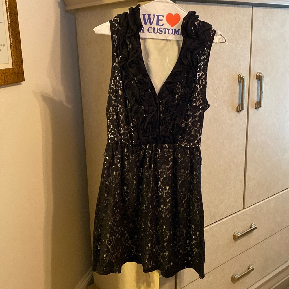The little lace dress with ruffles